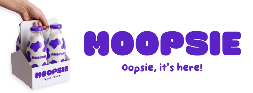 Moopsie wordmark with tagline Oopsie, it's here, beside a carrier of cow-print glass milk bottles